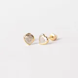 Par de caravanas con forma de corazón en oro amarillo 9k con engarce inglés y circonias.