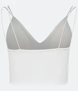 Blusa cropped blanca de punto roma con escote en pico y tirantes finos.