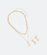 Conjunto de collar de doble cadena y aros tipo argolla, ambos dorados con colgantes de serpiente texturizada.