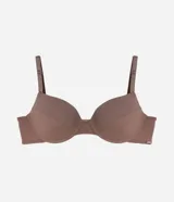 Soutien color nude de microfibra texturizada, con breteles ajustables y copas huecas.