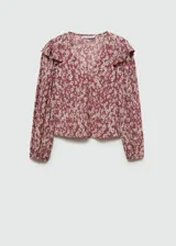 Blusa de manga larga con estampado floral en tonos rosa y blanco, escote en V, volantes en los hombros y puños elásticos.