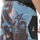 Short de baño negro con estampado de flores y logo de Rip Curl en el lateral.