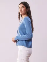 Cardigan tejido negro de algodón, marca Ninety. Escote a la base y abertura central con botones metálicos dorados. Delantera con bolsillos simulados.