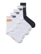 Pack de cinco pares de medias deportivas blancas con logo de Jack & Jones en color naranja y la inscripción "Since 1990". Confeccionadas en tejido de punto elástico, suave y respirable que brinda confort durante toda la jornada.
