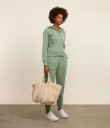 Pantalón deportivo verde agua, con cintura elástica y frisos delanteros.