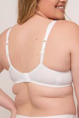 Soutien reductor con aro, confeccionado en lycra y puntilla elastizada color blanco. Tiene doble bretel con doble escote en microtul, breteles elásticos regulables y broches reforzados en la espalda.