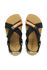 Sandalias Kenner Rakka Cross Craft, color negro y naranja, con suela de goma texturizada en verde agua.