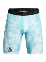 Short deportivo Under Armour con estampado abstracto en tonos naranja, amarillo y negro. Cintura elástica con logo Curry.