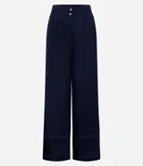 Pantalón pantalona azul marino de viscosa y lino, de tiro alto con botones y corte ancho.