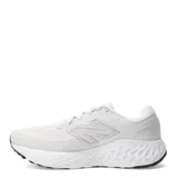 Championes New Balance Evoz V4 para running, color blanco con detalles en gris y suela negra.