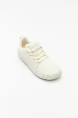 Zapatillas barefoot color celeste con interior amarillo y suela blanca.