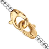 Pulsera de esferas pequeñas bañadas en plata con cierre de mosquetón entrelazado bañado en oro de 18k.