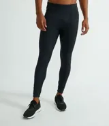 Calza deportiva de compresión negra, confeccionada en microfibra.