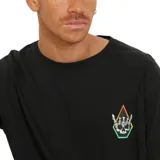 Remera negra de manga corta con cuello redondo y logo de Volcom estampado en el pecho.