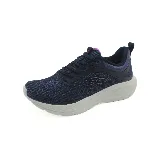 Championes deportivos Olympikus Vibe, color azul marino con detalles en violeta y suela gris.