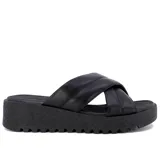 Sandalia de cuero negro con plataforma y tiras entrelazadas, diseñada para brindar comodidad y estilo.