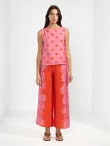 Musculosa de viscosa y poliamida con estampado de flores, con lazos en los costados.