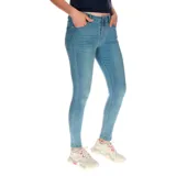 Pantalón de jean gris oscuro, corte skinny y tiro medio.