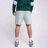 Short sin costuras en color menta, con cintura elástica y bolsillos laterales.