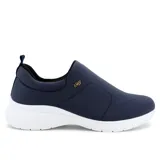 Championes deportivos casuales Usaflex Larisa color piel con suela blanca.