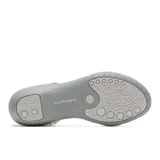 Sandalias Hush Puppies color gris con detalles en verde agua, con suela liviana y flexible.