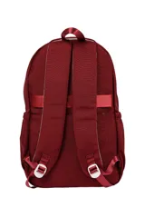 Mochila de diseño color block con tres secciones principales: superior gris claro, media blanca y inferior negra. Cuenta con múltiples compartimentos con cierres de cremallera y tiradores de cordón anudado.