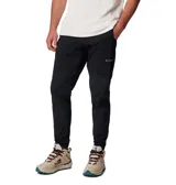 Pantalón de jogging negro con logo de Columbia en blanco en el muslo.