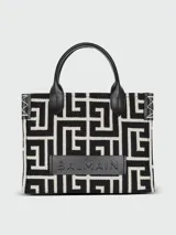 Bolso tote Balmain con monograma B-Army en jacquard blanco y negro, con aplique de cuero con el logo de la marca y asas de mano de cuero.