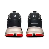 Championes urbanos negros con detalles en rojo y suela beige con tecnología CloudTec.