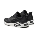 Championes Skechers Street Tres-Air Uno Revolution-Airy negros con detalles blancos. Capellada de malla con superposiciones termoselladas, cordones, plantilla Skechers Air-Cooled Memory Foam y cámara de aire visible Skech-Air.