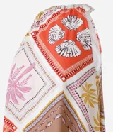 Vestido midi evasê sin mangas, confeccionado en viscolino con cuello halter y estampado tropical con cuadros e ilustraciones. El tejido contiene viscosa certificada.