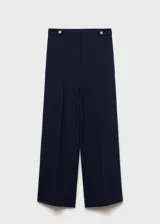 Pantalón azul marino de tiro medio y corte recto, con detalle de botones decorativos en la cintura y cierre frontal con botón, gancho y cremallera. Diseño crop.
