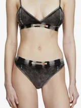 Calzoncillos tipo bikini de algodón elástico con efecto desteñido que imita el denim desgastado, color negro/gris. Presentan una banda elástica en la cintura con el logotipo icónico de Diesel.