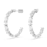 Aros tipo argolla Swarovski Mesmera bañados en rodio con circonias blancas de diferentes tallas engarzadas en garra. Cierre con perno.