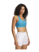 Top deportivo Under Armour color verde agua, con espalda cruzada y logo de la marca en la banda inferior.