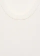 Musculosa azul marino de punto fino con tirantes finos y cuello redondo.