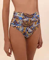 Calzón de bikini con faja cruzada y estampado abstracto en tonos marrón, azul y amarillo.