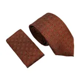 Corbata color marrón con estampado de flores pequeñas en amarillo y celeste. Incluye pañuelo de bolsillo a juego.