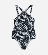 Malla enteriza de microfibra estampada con diseño de follaje en blanco y negro, con escote halter y detalle de aro dorado.