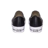 Championes urbanos Converse Chuck Taylor All Star con plataforma, color negro, capellada de cuero sintético y suela de goma blanca.