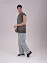 Musculosa verde militar con cuello redondo y estampado frontal con la leyenda "Street Culture" en letras blancas.