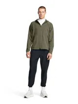 Pantalón deportivo Under Armour Unstoppable para hombre, color negro, de corte ajustado con puños elásticos en los tobillos y bolsillos laterales con cierre.