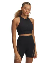 Musculosa deportiva negra con cierre frontal y almohadillas removibles.