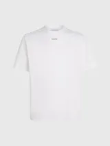 Remera blanca de algodón con cuello redondo y logo Calvin Klein nano estampado en el pecho.