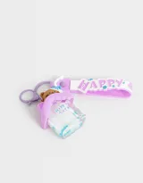 Llavero con dije de casita transparente con un oso adentro y un strap de silicona con la palabra "Happy".