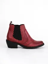 Botín Chelsea de cuero color borgoña con elástico lateral negro y taco bajo.