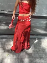 Falda larga de jersey, color verde claro con estampado abstracto en negro.