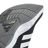 Championes Adidas Amplimove Trainer W, color negro con detalles blancos, ideales para entrenamiento. Presentan las tres tiras características de la marca en color blanco en el lateral.
