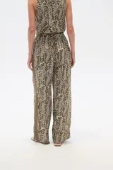 Pantalón de lyocell con estampado abstracto en tonos beige y negro, corte palazzo y cintura elastizada.