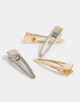 Set de cuatro hebillas para el pelo tipo pico de pato, dos doradas y dos plateadas.